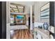 Inviting living room with hardwood floors, decorative ceiling, and modern fireplace at 1500 Elmwood St, Clearwater, FL 33755