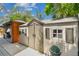 Spacious storage shed with double doors and a gazebo on the property at 1500 Elmwood St, Clearwater, FL 33755