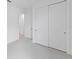 Bedroom showcasing closet with sliding doors, carpet, and white walls at 17200 Luminous Ave, Venice, FL 34293