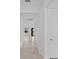 Hallway showcasing tile flooring and access to rooms at 17200 Luminous Ave, Venice, FL 34293