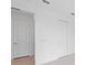 Hallway featuring multiple doorways at 17200 Luminous Ave, Venice, FL 34293
