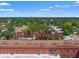 The top of a historic cigar factory showing the signage and view of the neighborhood beyond the building at 1816 E 15Th Ave, Tampa, FL 33605