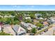 Aerial view showcases this home nestled among lush trees with a classic design and neighborhood charm at 1816 E 15Th Ave, Tampa, FL 33605