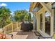 Outdoor back deck with a grill and access to the house through a door, perfect for outdoor cooking at 1816 E 15Th Ave, Tampa, FL 33605