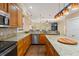 Well-equipped kitchen with granite countertops, stainless steel appliances, and ample cabinet space at 1816 E 15Th Ave, Tampa, FL 33605