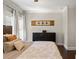Well lit main bedroom featuring wood floors, crown molding, and updated window dressings at 1816 E 15Th Ave, Tampa, FL 33605