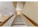 Bright staircase with white risers, wooden treads, and wood handrails at 1816 E 15Th Ave, Tampa, FL 33605