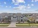 Stunning aerial view showcasing the home's curb appeal and proximity to neighboring houses at 19316 Eagle Creek Ln, Tampa, FL 33647