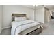 Bedroom features neutral paint, carpet flooring, and a window letting in plenty of natural light at 19316 Eagle Creek Ln, Tampa, FL 33647
