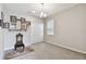 Neutral bedroom with shelving, closet, and window at 19316 Eagle Creek Ln, Tampa, FL 33647