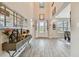 Spacious foyer with high ceilings, tile flooring, and decorative console table at 19316 Eagle Creek Ln, Tampa, FL 33647
