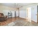Spacious living room with tile flooring and natural light coming through open doorways at 22465 Lewiston Ave, Port Charlotte, FL 33952