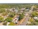 An elevated view of a neighborhood and the modern home with its convenient circular driveway at 2394 19Th Sw Ave, Largo, FL 33774