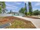 Beautifully renovated home boasts a new driveway and landscaping, enhancing its curb appeal at 2394 19Th Sw Ave, Largo, FL 33774