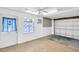Bright garage with door to exterior at 250 W Canal Dr, Palm Harbor, FL 34684
