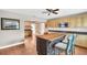 Eat-in kitchen with island and stainless appliances at 250 W Canal Dr, Palm Harbor, FL 34684