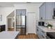 This kitchen features shaker cabinets, stainless steel appliances, and stone countertops at 2622 W Horatio St, Tampa, FL 33609