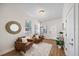 Cozy living room featuring two leather chairs, natural light, and elegant decor at 2622 W Horatio St, Tampa, FL 33609