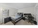 Cozy bedroom with natural light, comfortable bed, and work space at 2693 Sabal Springs Cir # 201, Clearwater, FL 33761