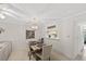 Cozy dining area with wood table, seating for four, and decorative accents at 2693 Sabal Springs Cir # 201, Clearwater, FL 33761