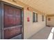 Inviting condo entrance highlighting unit 201, a secure screen door, and a convenient walkway at 2693 Sabal Springs Cir # 201, Clearwater, FL 33761