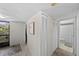 Entryway leading to bathroom and features a convenient coat closet for storage at 2693 Sabal Springs Cir # 201, Clearwater, FL 33761