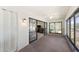 Spacious sun room with floor to ceiling windows and a tranquil view at 2693 Sabal Springs Cir # 201, Clearwater, FL 33761