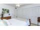 Bright bedroom featuring a comfortable bed, ceiling fan, closet, and tasteful decor at 2722 Sand Hollow Ct # 2722, Clearwater, FL 33761