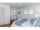 A cozy bedroom features wood floors, natural light, and a closet for storage at 2722 Sand Hollow Ct # 2722, Clearwater, FL 33761