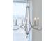 A stylish chandelier adds a touch of elegance to the space at 2722 Sand Hollow Ct # 2722, Clearwater, FL 33761