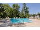 Inviting community pool with lounge chairs and clear blue water at 2722 Sand Hollow Ct # 2722, Clearwater, FL 33761