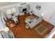 Bright living room featuring hardwood floors, comfortable furniture, and plenty of natural light at 2722 Sand Hollow Ct # 2722, Clearwater, FL 33761