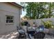 Spacious brick patio with Adirondack chairs, BBQ and privacy fence at 2722 Sand Hollow Ct # 2722, Clearwater, FL 33761