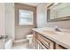 Bright bathroom with a vanity, faucet, and a toilet at 3072 Keene Park Dr, Largo, FL 33771