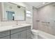 Beautifully updated bathroom with tiled shower and modern vanity at 3072 Keene Park Dr, Largo, FL 33771
