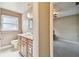Bathroom featuring a vanity with drawers and a toilet at 3072 Keene Park Dr, Largo, FL 33771