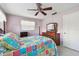 Bedroom showcasing unique bed frame, fan, and storage at 3072 Keene Park Dr, Largo, FL 33771