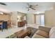 Bright living room seamlessly connected to the dining area and front entrance at 3072 Keene Park Dr, Largo, FL 33771