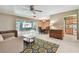 Bright and open living room with view of patio and pool at 3072 Keene Park Dr, Largo, FL 33771