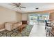 Inviting living room with comfortable seating and tile flooring at 3072 Keene Park Dr, Largo, FL 33771