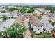 Overhead shot of a modern apartment building with well maintained greenery and brick-paved driveway at 310 S Habana Ave # 5, Tampa, FL 33609