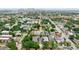 An aerial neighborhood view highlights the townhomes' location within a vibrant urban setting at 310 S Habana Ave # 5, Tampa, FL 33609