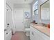 This bathroom offers a neutral color palette, modern fixtures, and a shower and tub combination at 310 S Habana Ave # 5, Tampa, FL 33609
