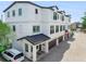 Tastefully designed townhouses with private garages, well-lit entrances, and a beautiful paved driveway at 310 S Habana Ave # 5, Tampa, FL 33609