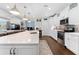 Open kitchen featuring a large island, stainless appliances, a beverage cooler, and an eat-in kitchen nook at 310 S Habana Ave # 5, Tampa, FL 33609