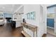Open-concept living space flows from dining area to a living room and kitchen with a kitchen island at 310 S Habana Ave # 5, Tampa, FL 33609