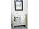 Bathroom vanity featuring a modern mirror and brushed nickel faucet at 3145 Munson St, New Port Richey, FL 34655
