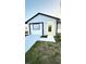 Charming single-story home with updated exterior paint, decorative trim, and a well-kept front yard at 3145 Munson St, New Port Richey, FL 34655