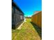 A well kept yard with a wood fence at 3145 Munson St, New Port Richey, FL 34655