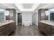 Beautiful bathroom with dual vanities, modern freestanding tub, and elegant light fixtures create a spa-like oasis at 3301 Bayshore Blvd # 2207B, Tampa, FL 33629